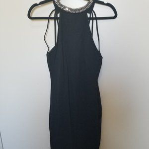 Sexy little black dress with open half back
